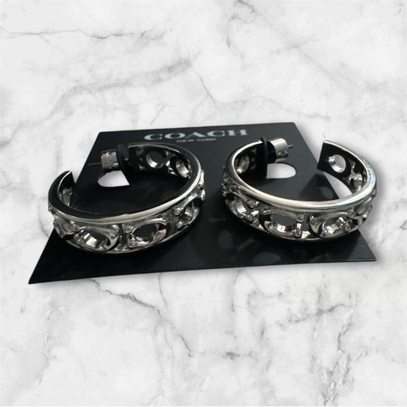 Coach Signature Openwork Hoop Earrings
Silver Tone - Picture 3 of 5